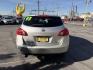 2009 Liquid Silver Metallic /Black Nissan Rogue SL (JN8AS58V29W) with an 2.5L I4 engine, AUTOMATIC transmission, located at 801 South State Street, Salt Lake City, UT, 84111, (801) 328-0098, 40.751953, -111.888206 - Clean title! In great condition! Perfect family suv for winter time! Great in the snow 4x4. Features: 4WD/AWD, ABS Brakes, AM/FM Stereo, Air Conditioning, Alloy Wheels, Automatic Transmission, Auxiliary Audio Input, Bluetooth Technology, CD Audio, Cloth Seats, Cruise Control, Overhead Airbags, Powe - Photo#6
