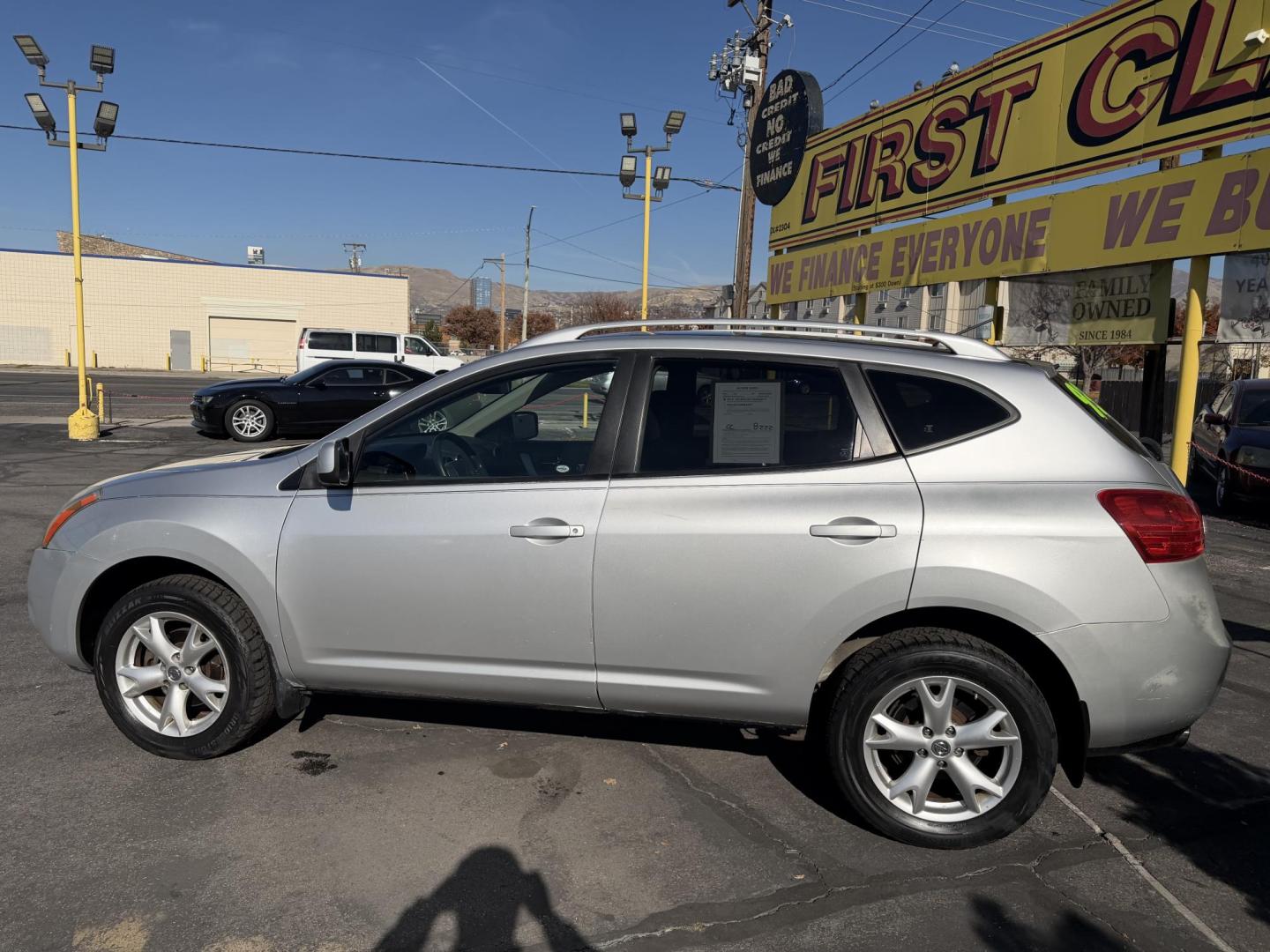 2009 Liquid Silver Metallic /Black Nissan Rogue SL (JN8AS58V29W) with an 2.5L I4 engine, AUTOMATIC transmission, located at 801 South State Street, Salt Lake City, UT, 84111, (801) 328-0098, 40.751953, -111.888206 - Clean title! In great condition! Perfect family suv for winter time! Great in the snow 4x4. Features: 4WD/AWD, ABS Brakes, AM/FM Stereo, Air Conditioning, Alloy Wheels, Automatic Transmission, Auxiliary Audio Input, Bluetooth Technology, CD Audio, Cloth Seats, Cruise Control, Overhead Airbags, Powe - Photo#7
