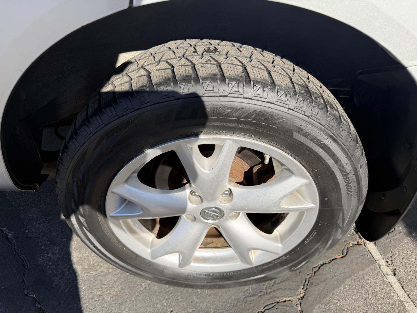 2009 Liquid Silver Metallic /Black Nissan Rogue SL (JN8AS58V29W) with an 2.5L I4 engine, AUTOMATIC transmission, located at 801 South State Street, Salt Lake City, UT, 84111, (801) 328-0098, 40.751953, -111.888206 - Clean title! In great condition! Perfect family suv for winter time! Great in the snow 4x4. Features: 4WD/AWD, ABS Brakes, AM/FM Stereo, Air Conditioning, Alloy Wheels, Automatic Transmission, Auxiliary Audio Input, Bluetooth Technology, CD Audio, Cloth Seats, Cruise Control, Overhead Airbags, Powe - Photo#8