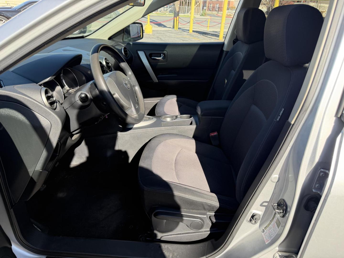 2009 Liquid Silver Metallic /Black Nissan Rogue SL (JN8AS58V29W) with an 2.5L I4 engine, AUTOMATIC transmission, located at 801 South State Street, Salt Lake City, UT, 84111, (801) 328-0098, 40.751953, -111.888206 - Clean title! In great condition! Perfect family suv for winter time! Great in the snow 4x4. Features: 4WD/AWD, ABS Brakes, AM/FM Stereo, Air Conditioning, Alloy Wheels, Automatic Transmission, Auxiliary Audio Input, Bluetooth Technology, CD Audio, Cloth Seats, Cruise Control, Overhead Airbags, Powe - Photo#9