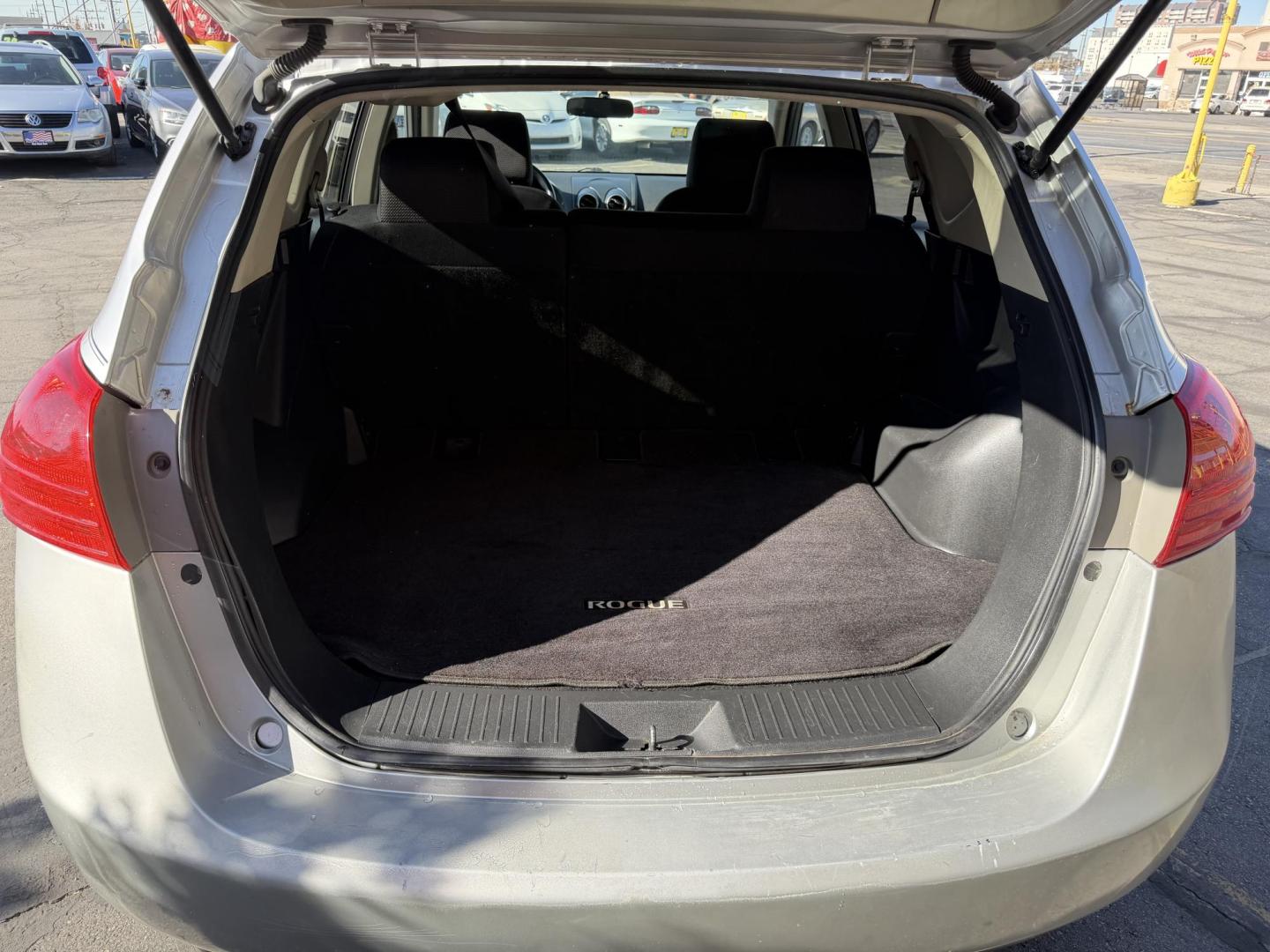 2009 Liquid Silver Metallic /Black Nissan Rogue SL (JN8AS58V29W) with an 2.5L I4 engine, AUTOMATIC transmission, located at 801 South State Street, Salt Lake City, UT, 84111, (801) 328-0098, 40.751953, -111.888206 - Clean title! In great condition! Perfect family suv for winter time! Great in the snow 4x4. Features: 4WD/AWD, ABS Brakes, AM/FM Stereo, Air Conditioning, Alloy Wheels, Automatic Transmission, Auxiliary Audio Input, Bluetooth Technology, CD Audio, Cloth Seats, Cruise Control, Overhead Airbags, Powe - Photo#17
