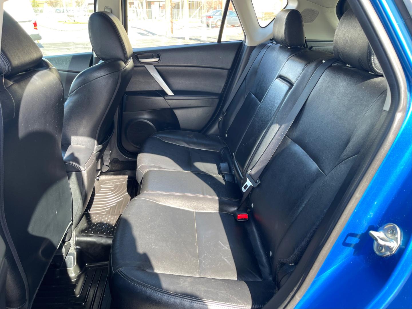 2012 Blue /BLACK Mazda MAZDA3 3 I Grand Touring (JM1BL1M78C1) with an 2.0 Liter 4 Cylinder engine, AUTOMATIC transmission, located at 801 South State Street, Salt Lake City, UT, 84111, (801) 328-0098, 40.751953, -111.888206 - "Get yourself into this exquisite 2012 Mazda MAZDA3! With impeccable handling, attractive design, great fuel efficiency, and top-notch safety features, it delivers an unmatched driving experience. Low mileage with a great price tag - It’s pre-owned, not pre-loved!" Features: Alloy Wheels, BOSE So - Photo#9