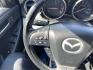 2012 Blue /BLACK Mazda MAZDA3 3 I Grand Touring (JM1BL1M78C1) with an 2.0 Liter 4 Cylinder engine, AUTOMATIC transmission, located at 801 South State Street, Salt Lake City, UT, 84111, (801) 328-0098, 40.751953, -111.888206 - "Get yourself into this exquisite 2012 Mazda MAZDA3! With impeccable handling, attractive design, great fuel efficiency, and top-notch safety features, it delivers an unmatched driving experience. Low mileage with a great price tag - It’s pre-owned, not pre-loved!" Features: Alloy Wheels, BOSE So - Photo#22