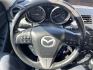 2012 Blue /BLACK Mazda MAZDA3 3 I Grand Touring (JM1BL1M78C1) with an 2.0 Liter 4 Cylinder engine, AUTOMATIC transmission, located at 801 South State Street, Salt Lake City, UT, 84111, (801) 328-0098, 40.751953, -111.888206 - "Get yourself into this exquisite 2012 Mazda MAZDA3! With impeccable handling, attractive design, great fuel efficiency, and top-notch safety features, it delivers an unmatched driving experience. Low mileage with a great price tag - It’s pre-owned, not pre-loved!" Features: Alloy Wheels, BOSE So - Photo#16