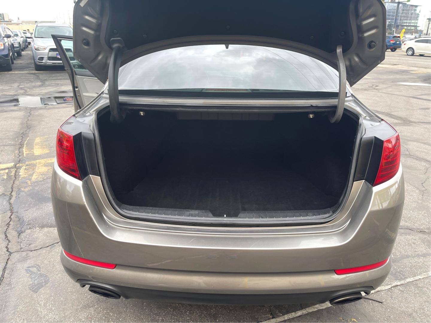 2013 Sterling Gray Metallic /Gray Kia Optima LX (5XXGM4A70DG) with an 2.4 Liter 4 Cylinder engine, AUTOMATIC transmission, located at 801 South State Street, Salt Lake City, UT, 84111, (801) 328-0098, 40.751953, -111.888206 - Discover the thrill of driving with our 2013 Kia Optima! It offers excellent performance, sleek design, and smart tech features. Experience the comfort of its well-appointed cabin. Perfect for those seeking high quality on a budget! Trust us, value never goes out of style! Features: Alloy Wheels, - Photo#12