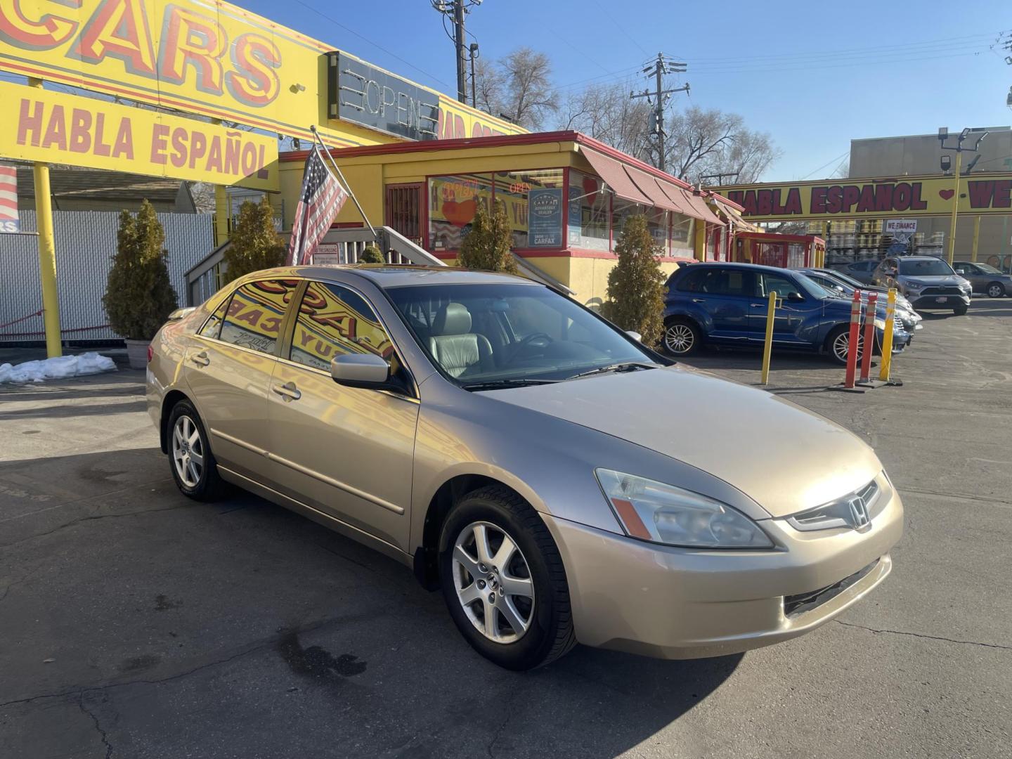 2005 Naples Gold Metallic /Tan Honda Accord EX (1HGCM66585A) with an 3.0Liter V6 engine, Automatic transmission, located at 801 South State Street, Salt Lake City, UT, 84111, (801) 328-0098, 40.751953, -111.888206 - Features: Alloy Wheels, Satellite Radio Ready, Front Seat Heaters, Sunroof(s), Leather Seats, ABS Brakes, CD Audio, Power Mirrors, Rear Spoiler, AM/FM Stereo, Cruise Control, Power Seat(s), Side Airbags, Air Conditioning, Overhead Airbags,	Power Windows, Traction Control, Automatic Transmission, Po - Photo#3