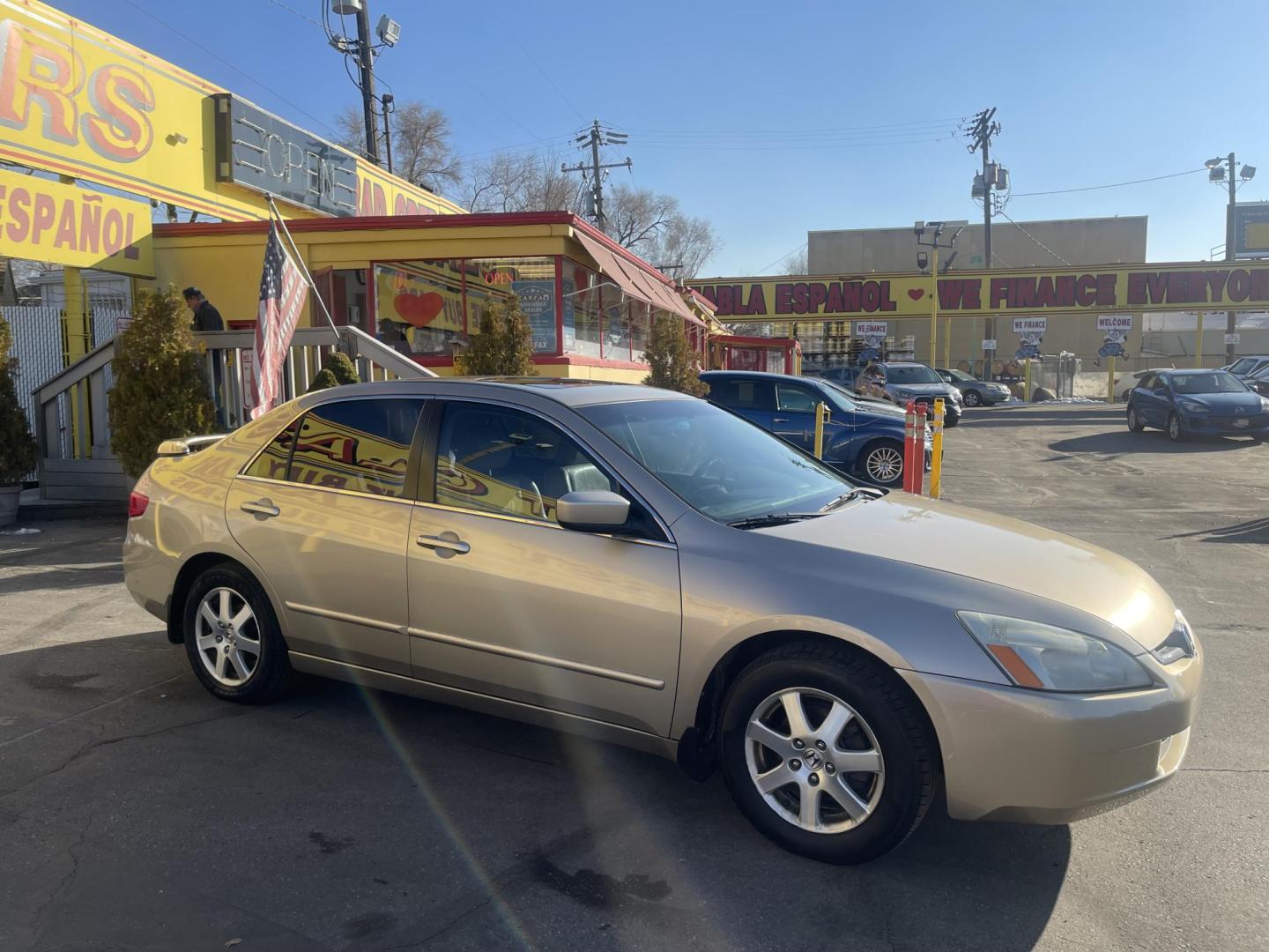 2005 Naples Gold Metallic /Tan Honda Accord EX (1HGCM66585A) with an 3.0Liter V6 engine, Automatic transmission, located at 801 South State Street, Salt Lake City, UT, 84111, (801) 328-0098, 40.751953, -111.888206 - Features: Alloy Wheels, Satellite Radio Ready, Front Seat Heaters, Sunroof(s), Leather Seats, ABS Brakes, CD Audio, Power Mirrors, Rear Spoiler, AM/FM Stereo, Cruise Control, Power Seat(s), Side Airbags, Air Conditioning, Overhead Airbags,	Power Windows, Traction Control, Automatic Transmission, Po - Photo#4