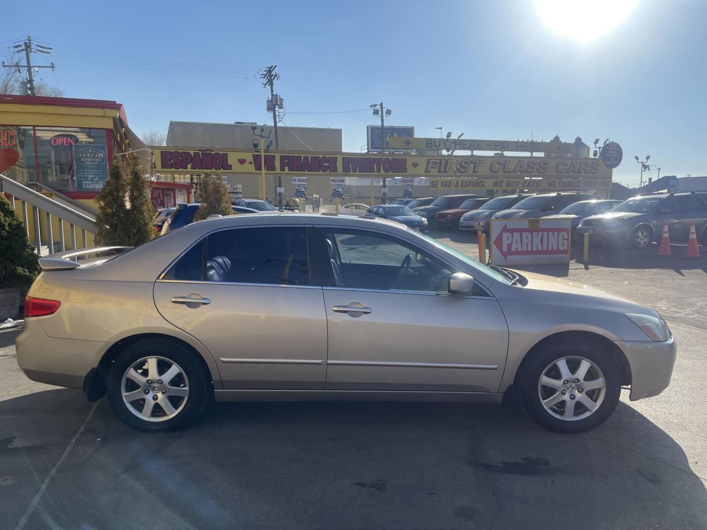 2005 Naples Gold Metallic /Tan Honda Accord EX (1HGCM66585A) with an 3.0Liter V6 engine, Automatic transmission, located at 801 South State Street, Salt Lake City, UT, 84111, (801) 328-0098, 40.751953, -111.888206 - Features: Alloy Wheels, Satellite Radio Ready, Front Seat Heaters, Sunroof(s), Leather Seats, ABS Brakes, CD Audio, Power Mirrors, Rear Spoiler, AM/FM Stereo, Cruise Control, Power Seat(s), Side Airbags, Air Conditioning, Overhead Airbags,	Power Windows, Traction Control, Automatic Transmission, Po - Photo#5