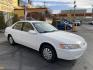 1999 Pure White /Tan Toyota Camry LE (JT2BG28KXX0) with an 2.2Liter 4 Cylinder engine, Automatic transmission, located at 801 South State Street, Salt Lake City, UT, 84111, (801) 328-0098, 40.751953, -111.888206 - Top Features:Cloth Seats, ABS Brakes, CD Audio, Power Mirrors, Side Airbags, AM/FM Stereo, Cassette Player, Power Seat(s), Air Conditioning, Cruise Control, Power Windows, Automatic Transmission, Power Locks, Rear Defroster "Experience unbeatable reliability with this 1999 used Toyota Camry. Boasti - Photo#3