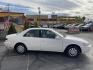 1999 Pure White /Tan Toyota Camry LE (JT2BG28KXX0) with an 2.2Liter 4 Cylinder engine, Automatic transmission, located at 801 South State Street, Salt Lake City, UT, 84111, (801) 328-0098, 40.751953, -111.888206 - Top Features:Cloth Seats, ABS Brakes, CD Audio, Power Mirrors, Side Airbags, AM/FM Stereo, Cassette Player, Power Seat(s), Air Conditioning, Cruise Control, Power Windows, Automatic Transmission, Power Locks, Rear Defroster "Experience unbeatable reliability with this 1999 used Toyota Camry. Boasti - Photo#4