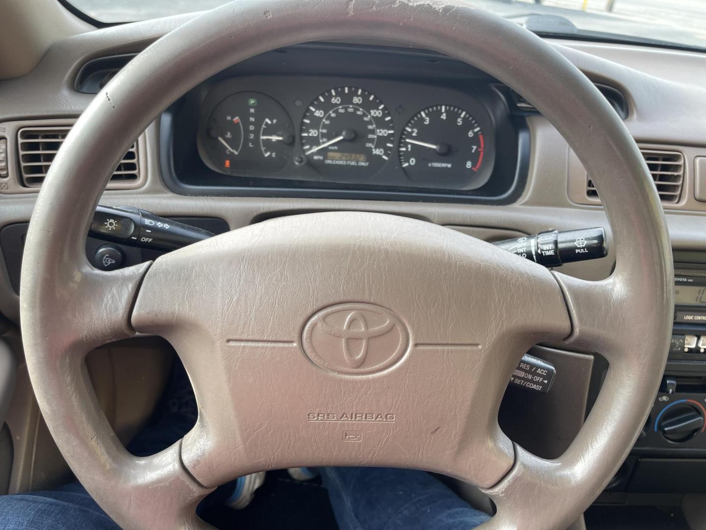 1999 Pure White /Tan Toyota Camry LE (JT2BG28KXX0) with an 2.2Liter 4 Cylinder engine, Automatic transmission, located at 801 South State Street, Salt Lake City, UT, 84111, (801) 328-0098, 40.751953, -111.888206 - Top Features:Cloth Seats, ABS Brakes, CD Audio, Power Mirrors, Side Airbags, AM/FM Stereo, Cassette Player, Power Seat(s), Air Conditioning, Cruise Control, Power Windows, Automatic Transmission, Power Locks, Rear Defroster "Experience unbeatable reliability with this 1999 used Toyota Camry. Boasti - Photo#16