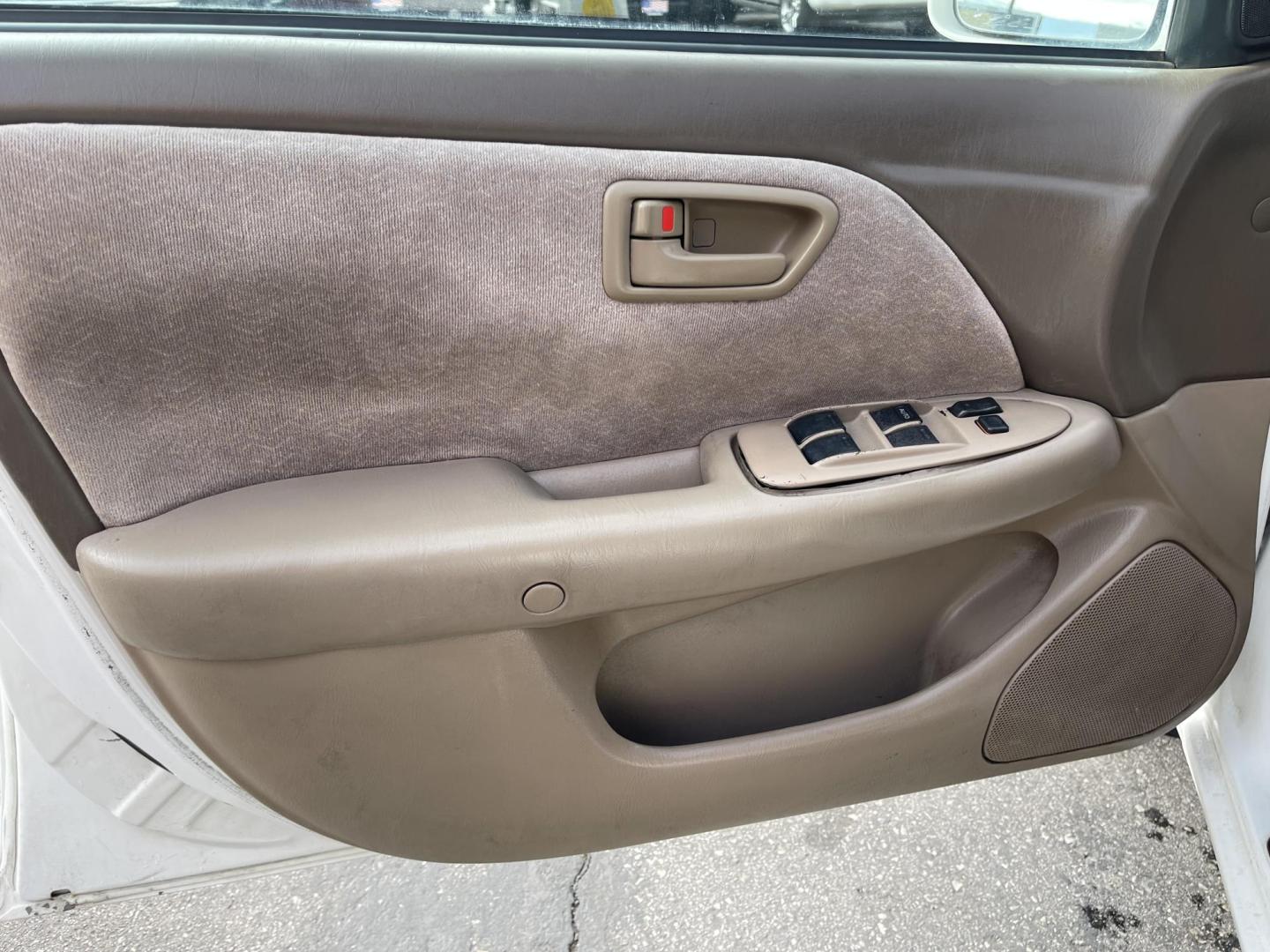 1999 Pure White /Tan Toyota Camry LE (JT2BG28KXX0) with an 2.2Liter 4 Cylinder engine, Automatic transmission, located at 801 South State Street, Salt Lake City, UT, 84111, (801) 328-0098, 40.751953, -111.888206 - Top Features:Cloth Seats, ABS Brakes, CD Audio, Power Mirrors, Side Airbags, AM/FM Stereo, Cassette Player, Power Seat(s), Air Conditioning, Cruise Control, Power Windows, Automatic Transmission, Power Locks, Rear Defroster "Experience unbeatable reliability with this 1999 used Toyota Camry. Boasti - Photo#18