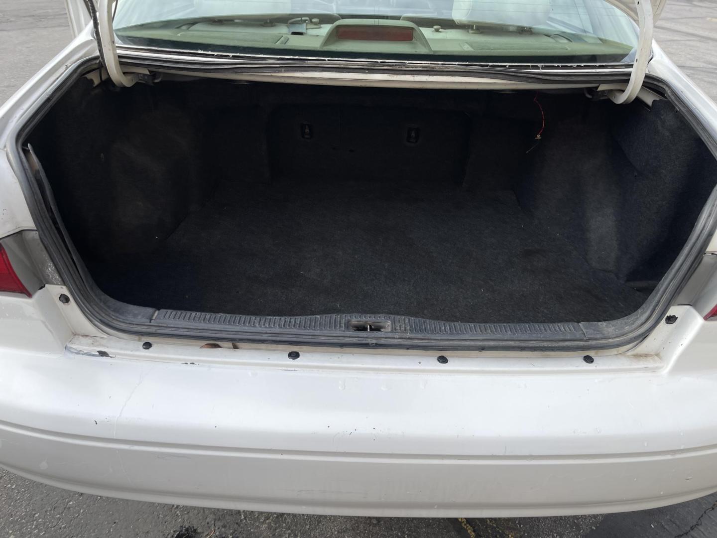 1999 Pure White /Tan Toyota Camry LE (JT2BG28KXX0) with an 2.2Liter 4 Cylinder engine, Automatic transmission, located at 801 South State Street, Salt Lake City, UT, 84111, (801) 328-0098, 40.751953, -111.888206 - Top Features:Cloth Seats, ABS Brakes, CD Audio, Power Mirrors, Side Airbags, AM/FM Stereo, Cassette Player, Power Seat(s), Air Conditioning, Cruise Control, Power Windows, Automatic Transmission, Power Locks, Rear Defroster "Experience unbeatable reliability with this 1999 used Toyota Camry. Boasti - Photo#20