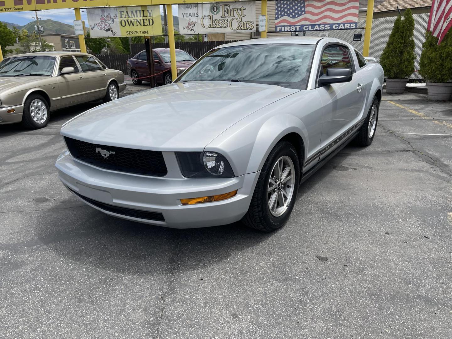 2005 Silver Sky Metallic /Black Ford Mustang Base (1ZVFT80N055) with an 4.0 L V6 engine, Automatic transmission, located at 801 South State Street, Salt Lake City, UT, 84111, (801) 328-0098, 40.751953, -111.888206 - Clean title! no rebuilt restored nice Mustang hard to find! Must see!!! Features: Alloy Wheels, Cloth Seats, ABS Brakes, Automatic Transmission, Power Locks, Power Windows, AM/FM Stereo, CD Audio, Power Mirrors, Rear Defroster, Air Conditioning, Cruise Control, Power Seat(s), Rear Spoiler * All ad - Photo#2