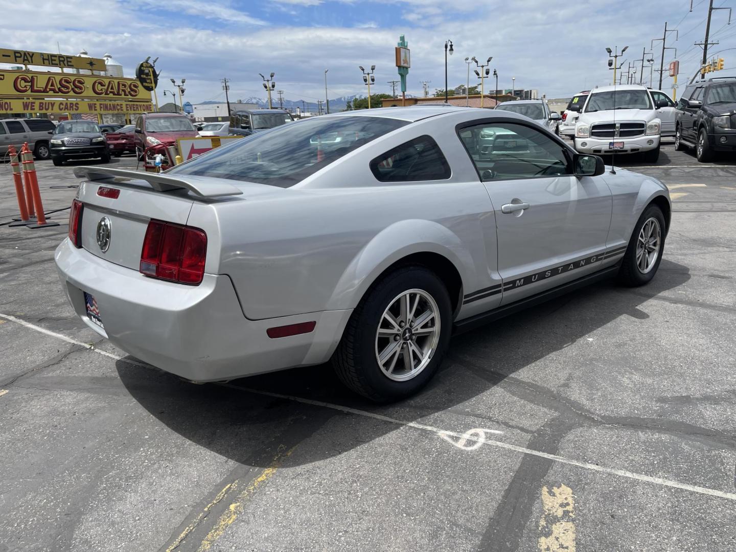 2005 Silver Sky Metallic /Black Ford Mustang Base (1ZVFT80N055) with an 4.0 L V6 engine, Automatic transmission, located at 801 South State Street, Salt Lake City, UT, 84111, (801) 328-0098, 40.751953, -111.888206 - Clean title! no rebuilt restored nice Mustang hard to find! Must see!!! Features: Alloy Wheels, Cloth Seats, ABS Brakes, Automatic Transmission, Power Locks, Power Windows, AM/FM Stereo, CD Audio, Power Mirrors, Rear Defroster, Air Conditioning, Cruise Control, Power Seat(s), Rear Spoiler * All ad - Photo#5