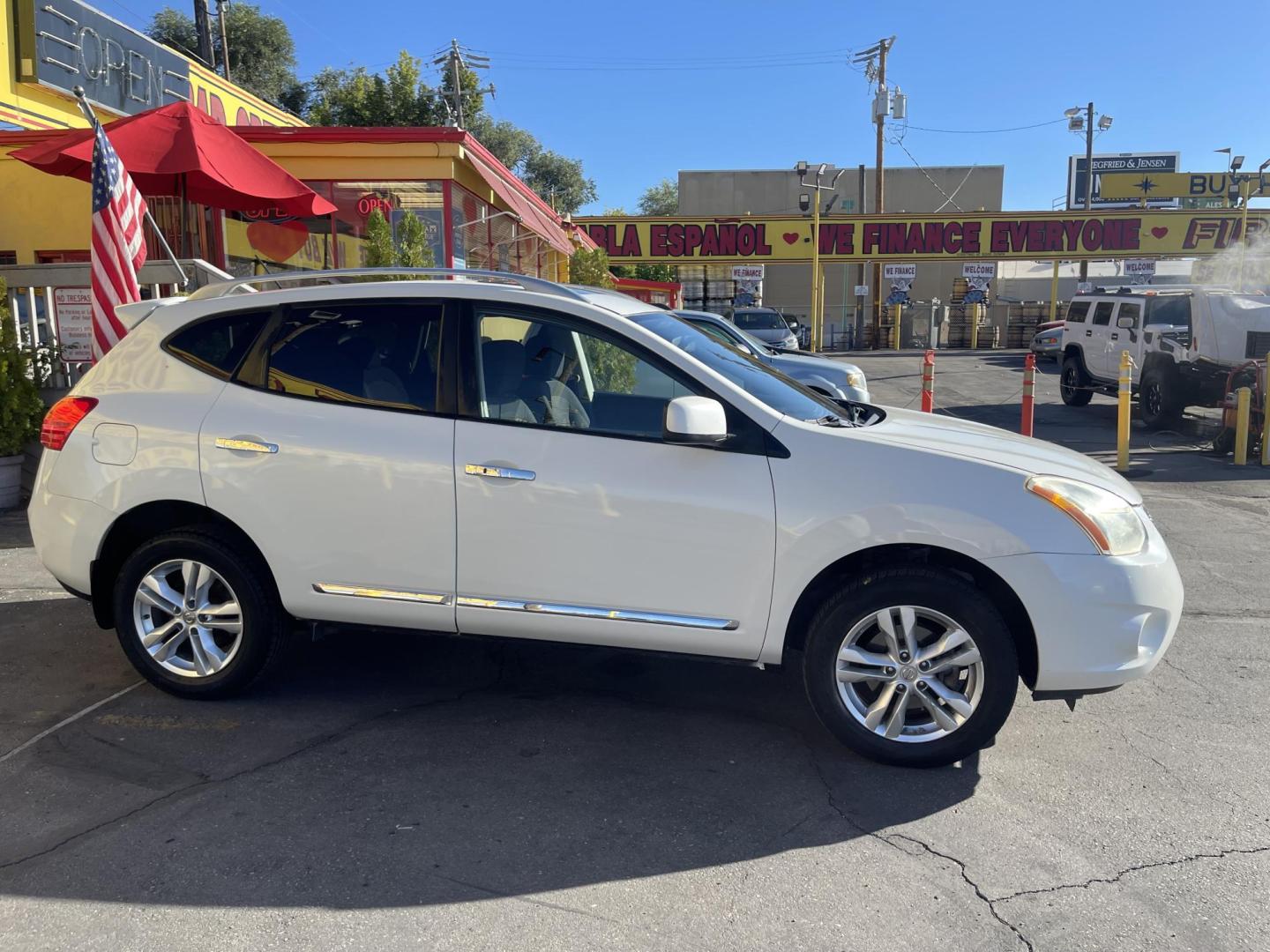 2013 Artic White /Black Nissan Rogue SV (JN8AS5MV6DW) with an 2.5L I4 engine, Automatic transmission, located at 801 South State Street, Salt Lake City, UT, 84111, (801) 328-0098, 40.751953, -111.888206 - Clean title! AWD great all around winter SUV! Must see it is in clean condition, has lots of extras. Approved for up to a 5 year warranty that can be added on to the vehicle! Features: 4WD/AWD, Navigation System, Alloy Wheels, Rear View Camera, BOSE Sound System, Satellite Radio Ready, Bluetooth T - Photo#5