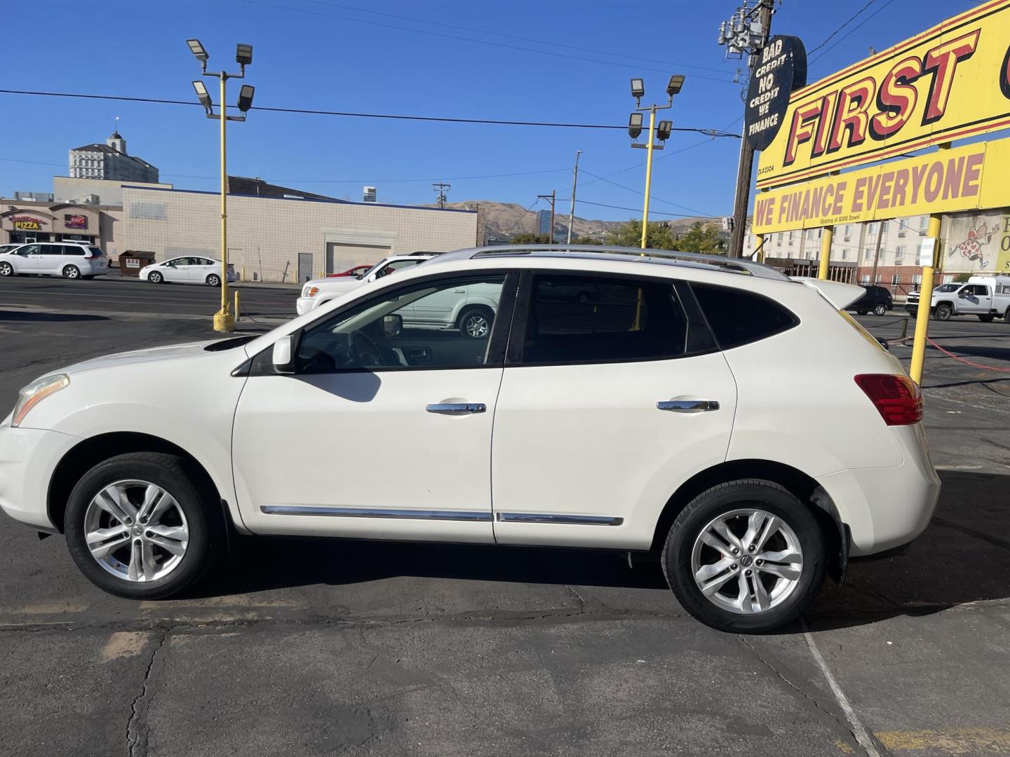 2013 Artic White /Black Nissan Rogue SV (JN8AS5MV6DW) with an 2.5L I4 engine, Automatic transmission, located at 801 South State Street, Salt Lake City, UT, 84111, (801) 328-0098, 40.751953, -111.888206 - Clean title! AWD great all around winter SUV! Must see it is in clean condition, has lots of extras. Approved for up to a 5 year warranty that can be added on to the vehicle! Features: 4WD/AWD, Navigation System, Alloy Wheels, Rear View Camera, BOSE Sound System, Satellite Radio Ready, Bluetooth T - Photo#9