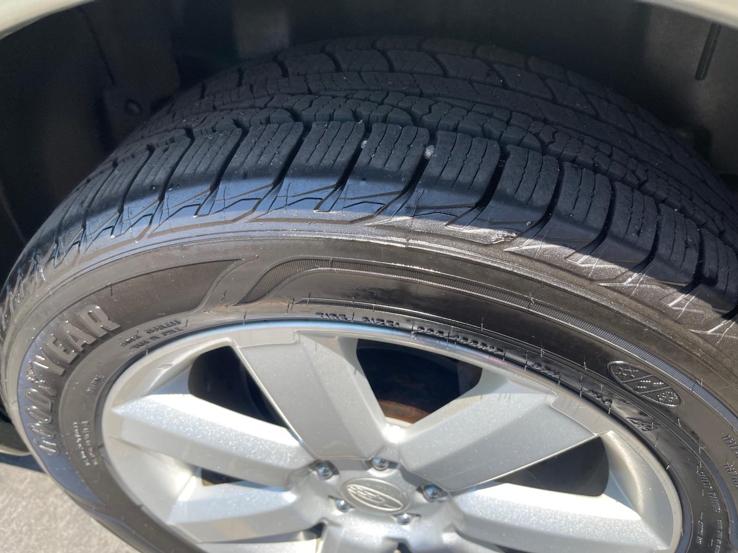2007 Evergreen Frost Metallic /Tan Subaru Outback Crossover Wagon (4S4BP61CX77) with an 2.5L H4 engine, Automatic transmission, located at 801 South State Street, Salt Lake City, UT, 84111, (801) 328-0098, 40.751953, -111.888206 - Features: 4WD/AWD, Alloy Wheels, Cloth Seats, Front Seat Heaters, ABS Brakes, Auxiliary Audio Input, Overhead Airbags, Rear Defroster, AM/FM Stereo, CD Audio, Power Locks, Side Airbags, Air Conditioning, Cruise Control, Power Mirrors, Automatic Transmission, Full Roof Rack, Power Windows. - Photo#14