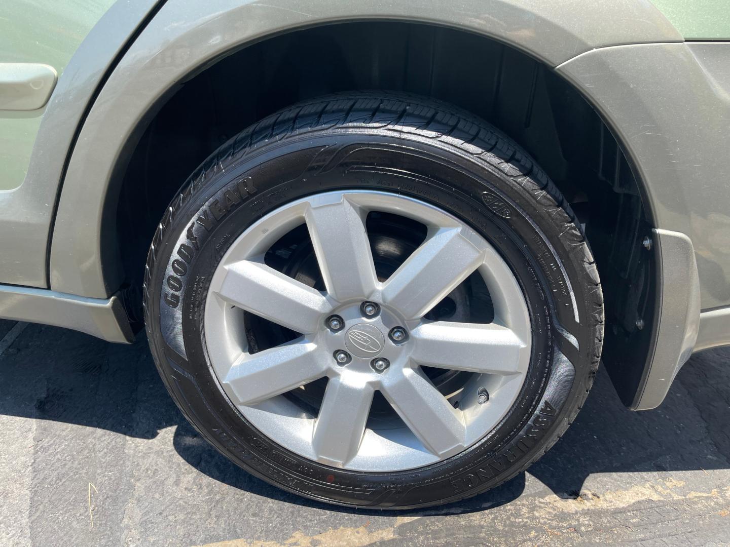 2007 Evergreen Frost Metallic /Tan Subaru Outback Crossover Wagon (4S4BP61CX77) with an 2.5L H4 engine, Automatic transmission, located at 801 South State Street, Salt Lake City, UT, 84111, (801) 328-0098, 40.751953, -111.888206 - Features: 4WD/AWD, Alloy Wheels, Cloth Seats, Front Seat Heaters, ABS Brakes, Auxiliary Audio Input, Overhead Airbags, Rear Defroster, AM/FM Stereo, CD Audio, Power Locks, Side Airbags, Air Conditioning, Cruise Control, Power Mirrors, Automatic Transmission, Full Roof Rack, Power Windows. - Photo#13