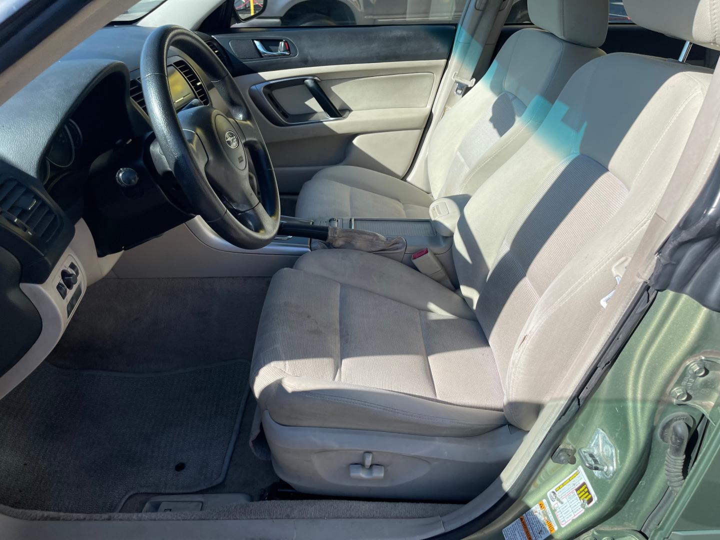 2007 Evergreen Frost Metallic /Tan Subaru Outback Crossover Wagon (4S4BP61CX77) with an 2.5L H4 engine, Automatic transmission, located at 801 South State Street, Salt Lake City, UT, 84111, (801) 328-0098, 40.751953, -111.888206 - Features: 4WD/AWD, Alloy Wheels, Cloth Seats, Front Seat Heaters, ABS Brakes, Auxiliary Audio Input, Overhead Airbags, Rear Defroster, AM/FM Stereo, CD Audio, Power Locks, Side Airbags, Air Conditioning, Cruise Control, Power Mirrors, Automatic Transmission, Full Roof Rack, Power Windows. - Photo#15