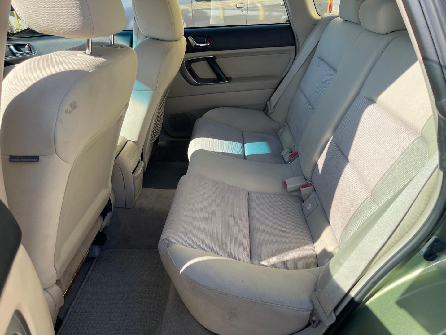 2007 Evergreen Frost Metallic /Tan Subaru Outback Crossover Wagon (4S4BP61CX77) with an 2.5L H4 engine, Automatic transmission, located at 801 South State Street, Salt Lake City, UT, 84111, (801) 328-0098, 40.751953, -111.888206 - Features: 4WD/AWD, Alloy Wheels, Cloth Seats, Front Seat Heaters, ABS Brakes, Auxiliary Audio Input, Overhead Airbags, Rear Defroster, AM/FM Stereo, CD Audio, Power Locks, Side Airbags, Air Conditioning, Cruise Control, Power Mirrors, Automatic Transmission, Full Roof Rack, Power Windows. - Photo#16
