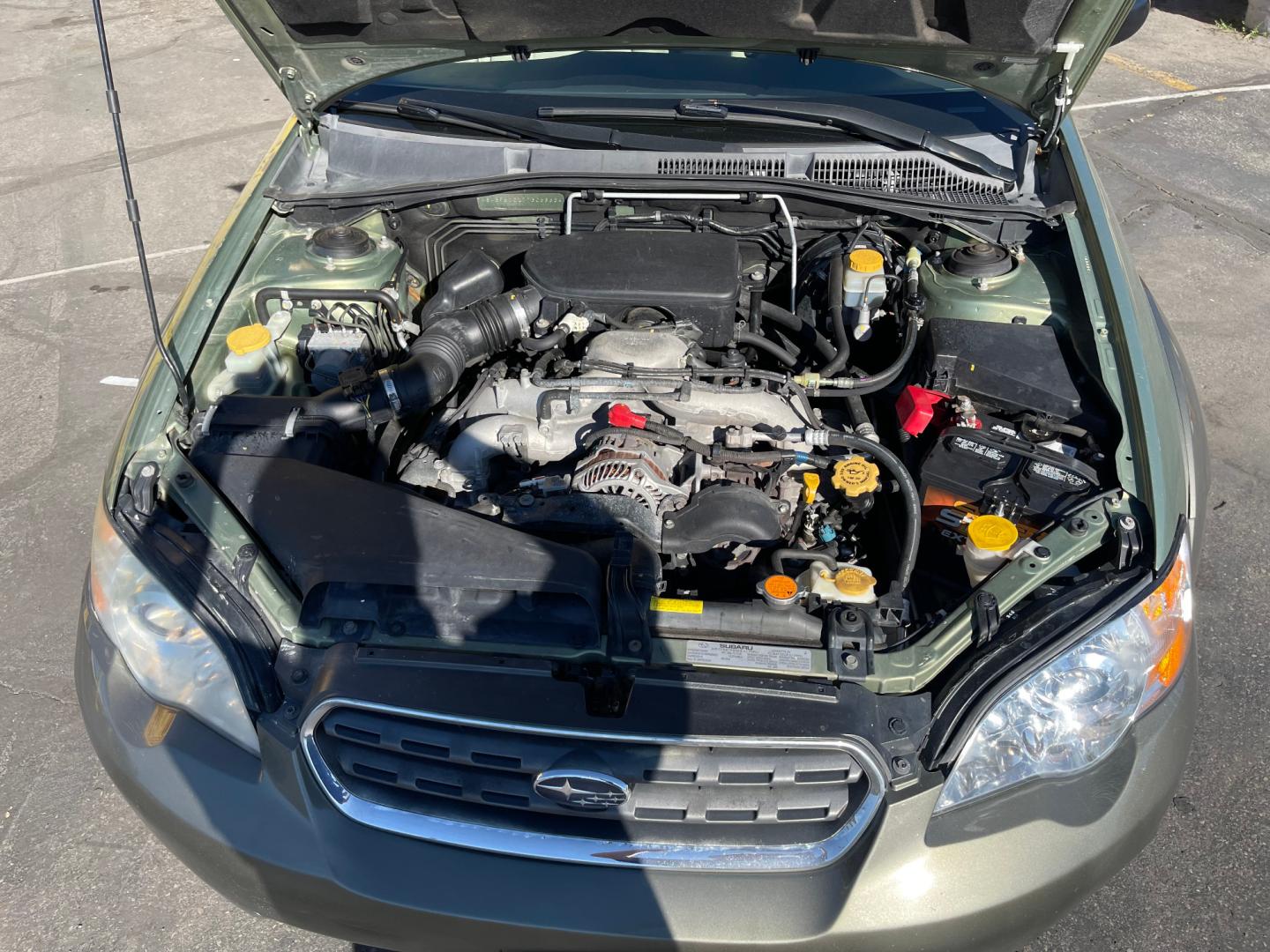 2007 Evergreen Frost Metallic /Tan Subaru Outback Crossover Wagon (4S4BP61CX77) with an 2.5L H4 engine, Automatic transmission, located at 801 South State Street, Salt Lake City, UT, 84111, (801) 328-0098, 40.751953, -111.888206 - Features: 4WD/AWD, Alloy Wheels, Cloth Seats, Front Seat Heaters, ABS Brakes, Auxiliary Audio Input, Overhead Airbags, Rear Defroster, AM/FM Stereo, CD Audio, Power Locks, Side Airbags, Air Conditioning, Cruise Control, Power Mirrors, Automatic Transmission, Full Roof Rack, Power Windows. - Photo#23