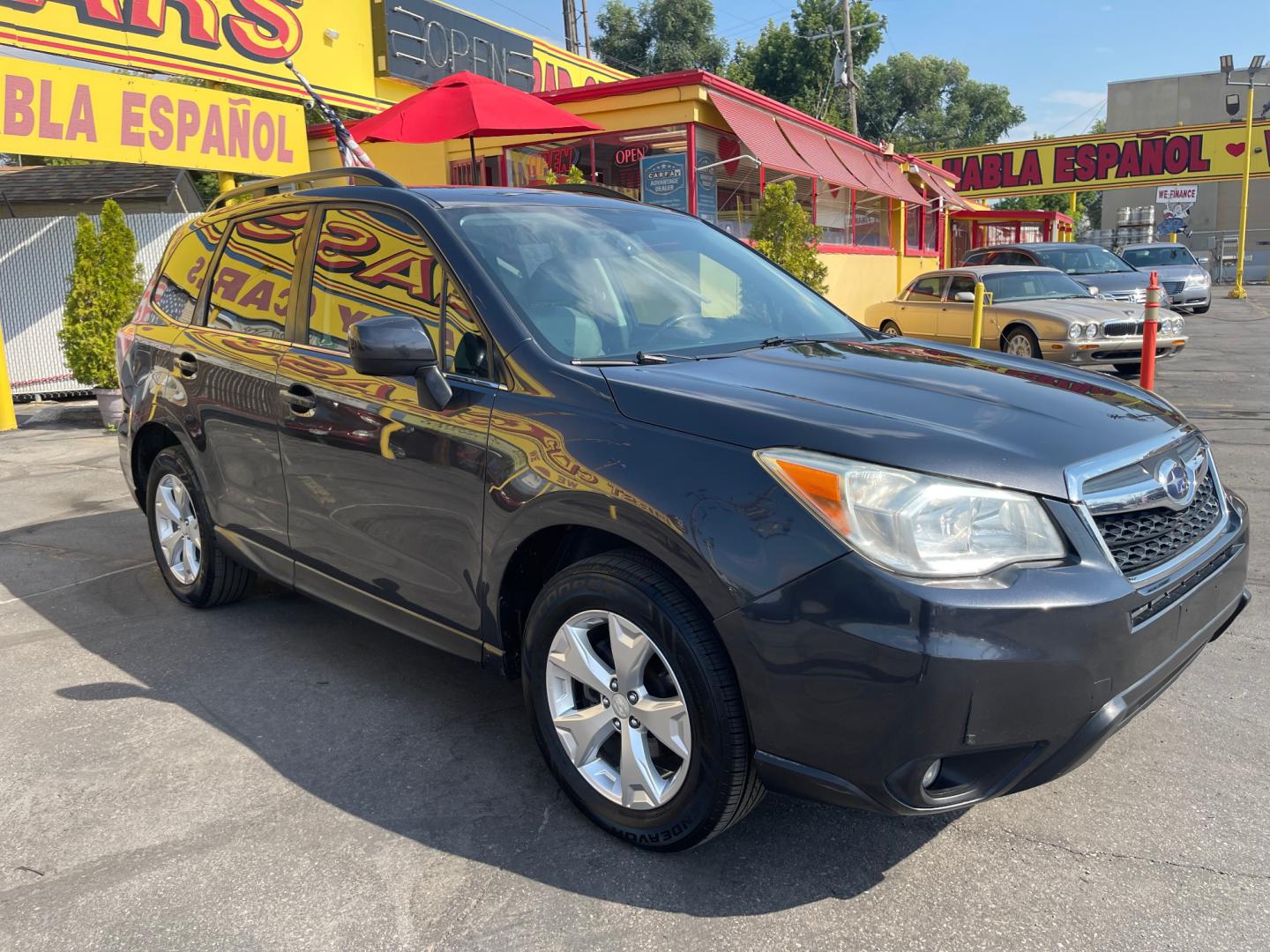 2014 Black Metallic /Tan Subaru Forester Limited X (JF2SJAHC6EH) with an 2.5L H4 engine, Automatic transmission, located at 801 South State Street, Salt Lake City, UT, 84111, (801) 328-0098, 40.751953, -111.888206 - Clean title! Only 2 owners on the Carfax history report. Features: AWD (All wheel Drive), Leather Seats, Bluetooth radio, touchscreen display, power seats, power sunroof, heated seats, power locks, power windows, power sunroof, Aux input, Alloy Wheels, Automatic, keyless entry, alarm, 2.5 liter, 4 - Photo#2