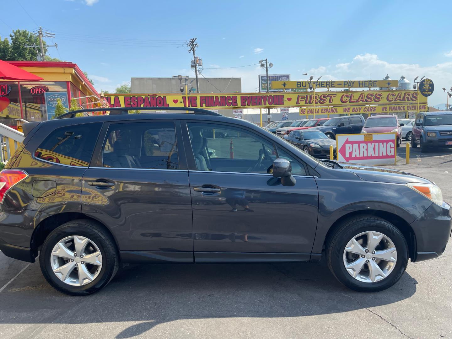 2014 Black Metallic /Tan Subaru Forester Limited X (JF2SJAHC6EH) with an 2.5L H4 engine, Automatic transmission, located at 801 South State Street, Salt Lake City, UT, 84111, (801) 328-0098, 40.751953, -111.888206 - Clean title! Only 2 owners on the Carfax history report. Features: AWD (All wheel Drive), Leather Seats, Bluetooth radio, touchscreen display, power seats, power sunroof, heated seats, power locks, power windows, power sunroof, Aux input, Alloy Wheels, Automatic, keyless entry, alarm, 2.5 liter, 4 - Photo#3