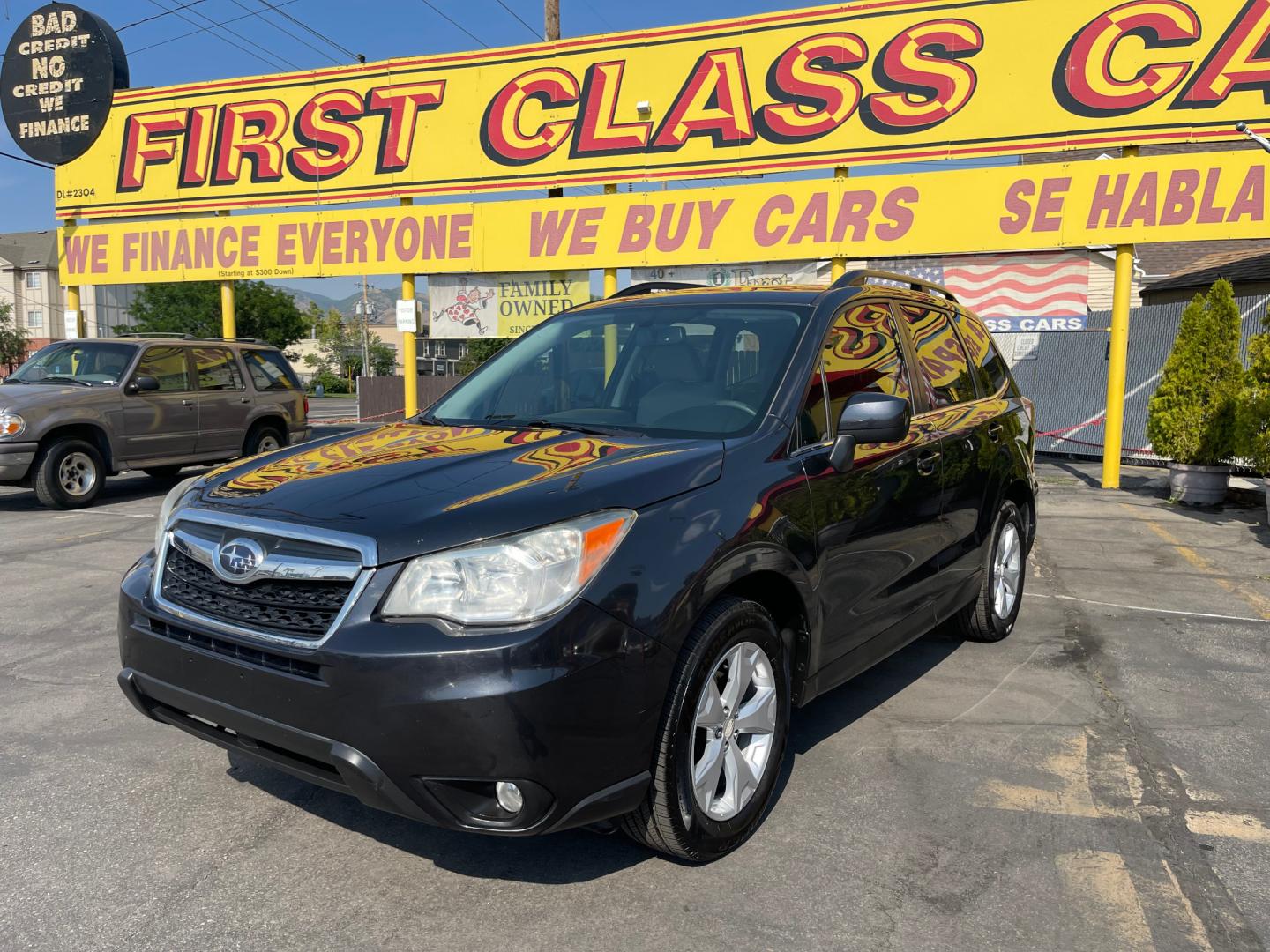 2014 Black Metallic /Tan Subaru Forester Limited X (JF2SJAHC6EH) with an 2.5L H4 engine, Automatic transmission, located at 801 South State Street, Salt Lake City, UT, 84111, (801) 328-0098, 40.751953, -111.888206 - Clean title! Only 2 owners on the Carfax history report. Features: AWD (All wheel Drive), Leather Seats, Bluetooth radio, touchscreen display, power seats, power sunroof, heated seats, power locks, power windows, power sunroof, Aux input, Alloy Wheels, Automatic, keyless entry, alarm, 2.5 liter, 4 - Photo#0