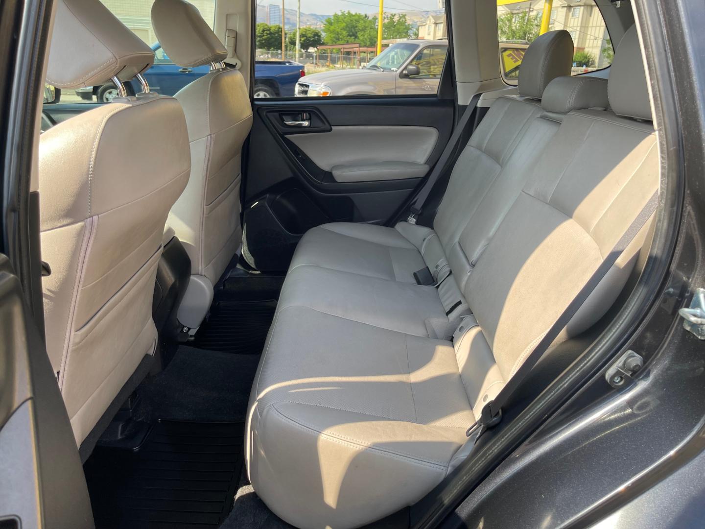 2014 Black Metallic /Tan Subaru Forester Limited X (JF2SJAHC6EH) with an 2.5L H4 engine, Automatic transmission, located at 801 South State Street, Salt Lake City, UT, 84111, (801) 328-0098, 40.751953, -111.888206 - Clean title! Only 2 owners on the Carfax history report. Features: AWD (All wheel Drive), Leather Seats, Bluetooth radio, touchscreen display, power seats, power sunroof, heated seats, power locks, power windows, power sunroof, Aux input, Alloy Wheels, Automatic, keyless entry, alarm, 2.5 liter, 4 - Photo#11