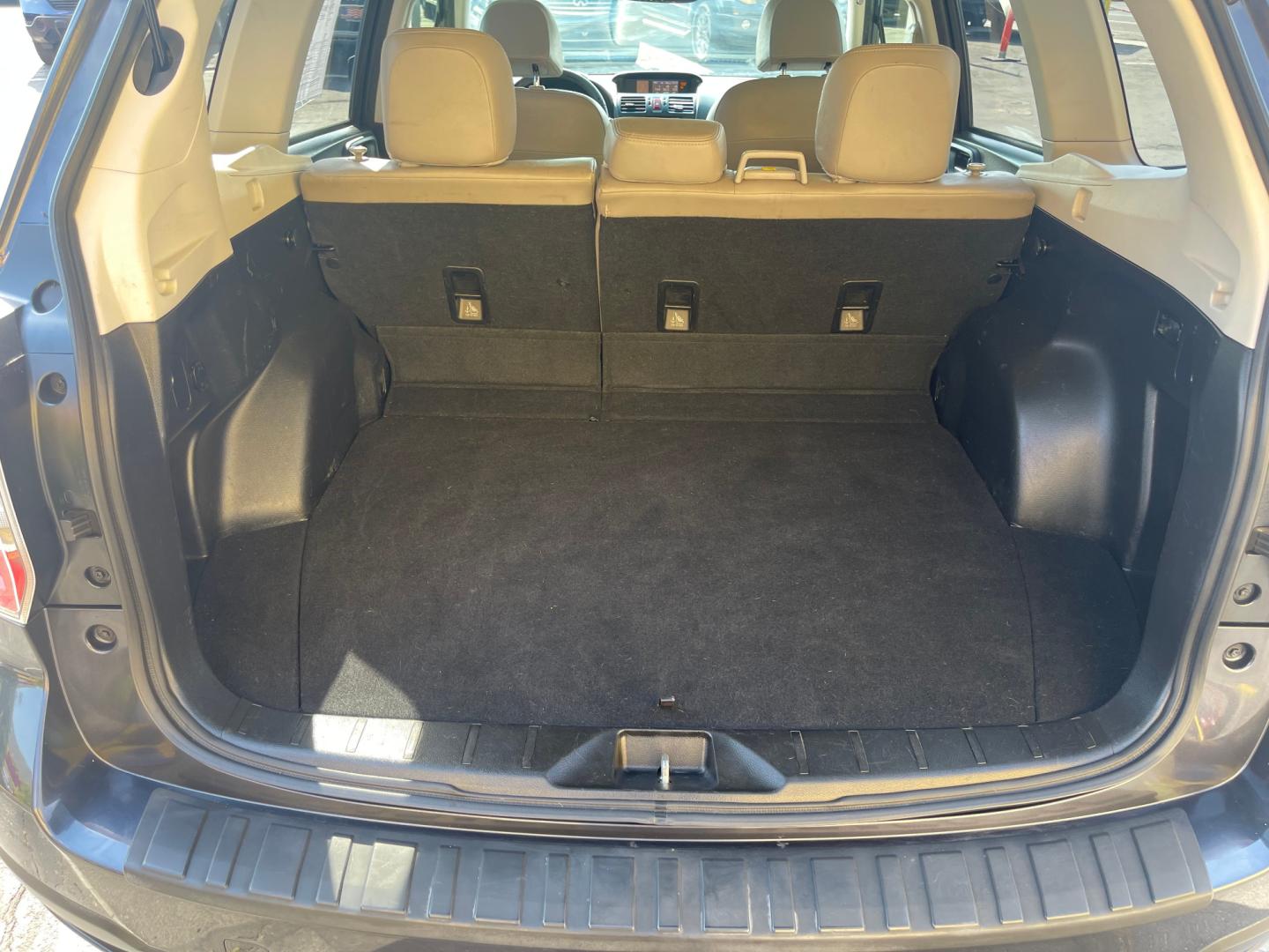 2014 Black Metallic /Tan Subaru Forester Limited X (JF2SJAHC6EH) with an 2.5L H4 engine, Automatic transmission, located at 801 South State Street, Salt Lake City, UT, 84111, (801) 328-0098, 40.751953, -111.888206 - Clean title! Only 2 owners on the Carfax history report. Features: AWD (All wheel Drive), Leather Seats, Bluetooth radio, touchscreen display, power seats, power sunroof, heated seats, power locks, power windows, power sunroof, Aux input, Alloy Wheels, Automatic, keyless entry, alarm, 2.5 liter, 4 - Photo#27