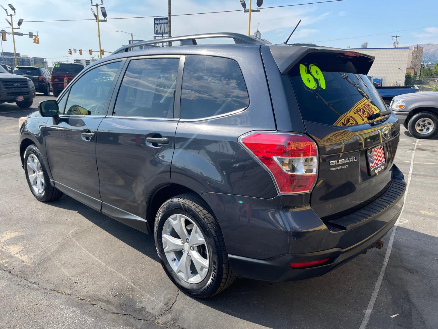 2014 Black Metallic /Tan Subaru Forester Limited X (JF2SJAHC6EH) with an 2.5L H4 engine, Automatic transmission, located at 801 South State Street, Salt Lake City, UT, 84111, (801) 328-0098, 40.751953, -111.888206 - Clean title! Only 2 owners on the Carfax history report. Features: AWD (All wheel Drive), Leather Seats, Bluetooth radio, touchscreen display, power seats, power sunroof, heated seats, power locks, power windows, power sunroof, Aux input, Alloy Wheels, Automatic, keyless entry, alarm, 2.5 liter, 4 - Photo#7