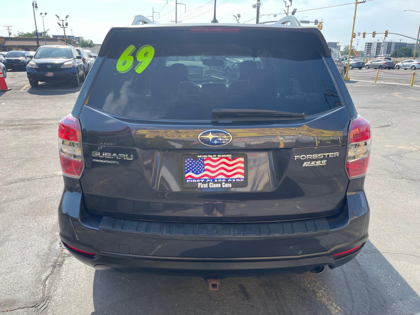 2014 Black Metallic /Tan Subaru Forester Limited X (JF2SJAHC6EH) with an 2.5L H4 engine, Automatic transmission, located at 801 South State Street, Salt Lake City, UT, 84111, (801) 328-0098, 40.751953, -111.888206 - Clean title! Only 2 owners on the Carfax history report. Features: AWD (All wheel Drive), Leather Seats, Bluetooth radio, touchscreen display, power seats, power sunroof, heated seats, power locks, power windows, power sunroof, Aux input, Alloy Wheels, Automatic, keyless entry, alarm, 2.5 liter, 4 - Photo#6