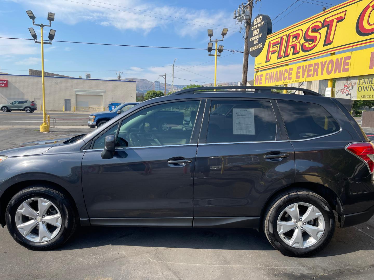 2014 Black Metallic /Tan Subaru Forester Limited X (JF2SJAHC6EH) with an 2.5L H4 engine, Automatic transmission, located at 801 South State Street, Salt Lake City, UT, 84111, (801) 328-0098, 40.751953, -111.888206 - Clean title! Only 2 owners on the Carfax history report. Features: AWD (All wheel Drive), Leather Seats, Bluetooth radio, touchscreen display, power seats, power sunroof, heated seats, power locks, power windows, power sunroof, Aux input, Alloy Wheels, Automatic, keyless entry, alarm, 2.5 liter, 4 - Photo#9