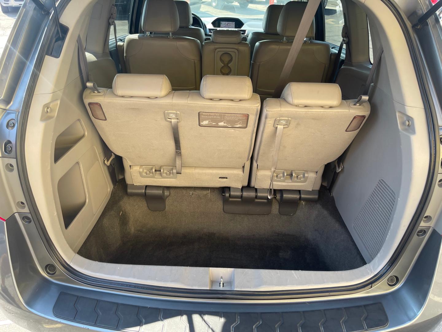 2013 Sterling Gray Metallic /Tan Honda Odyssey EX-L (5FNRL5H63DB) with an 3.5L V6 engine, Automatic transmission, located at 801 South State Street, Salt Lake City, UT, 84111, (801) 328-0098, 40.751953, -111.888206 - Clean title! 8 passenger van very clean condition! Easy clean leather interior! Features: Alloy Wheels, Rear Air Conditioning, Bluetooth Technology, Rear Sunshade, Fold-Away Third Row, Rear View Camera, Front Seat Heaters, Satellite Radio Ready, Leather Seats, Sunroof(s), Navigation System, Third - Photo#25
