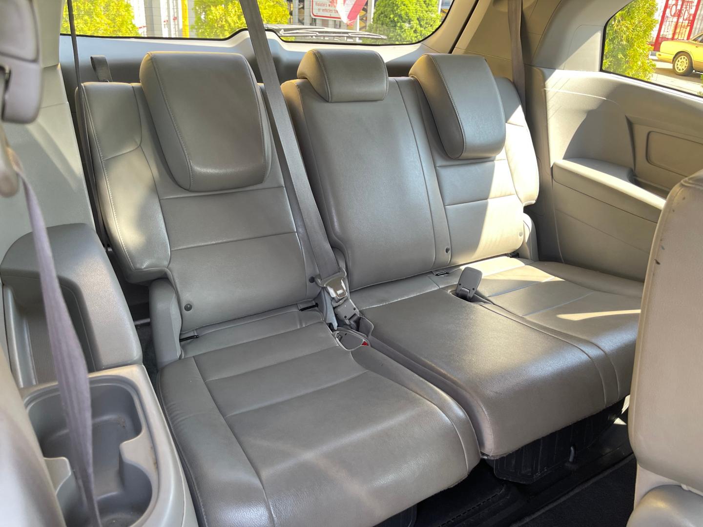 2013 Sterling Gray Metallic /Tan Honda Odyssey EX-L (5FNRL5H63DB) with an 3.5L V6 engine, Automatic transmission, located at 801 South State Street, Salt Lake City, UT, 84111, (801) 328-0098, 40.751953, -111.888206 - Clean title! 8 passenger van very clean condition! Easy clean leather interior! Features: Alloy Wheels, Rear Air Conditioning, Bluetooth Technology, Rear Sunshade, Fold-Away Third Row, Rear View Camera, Front Seat Heaters, Satellite Radio Ready, Leather Seats, Sunroof(s), Navigation System, Third - Photo#22