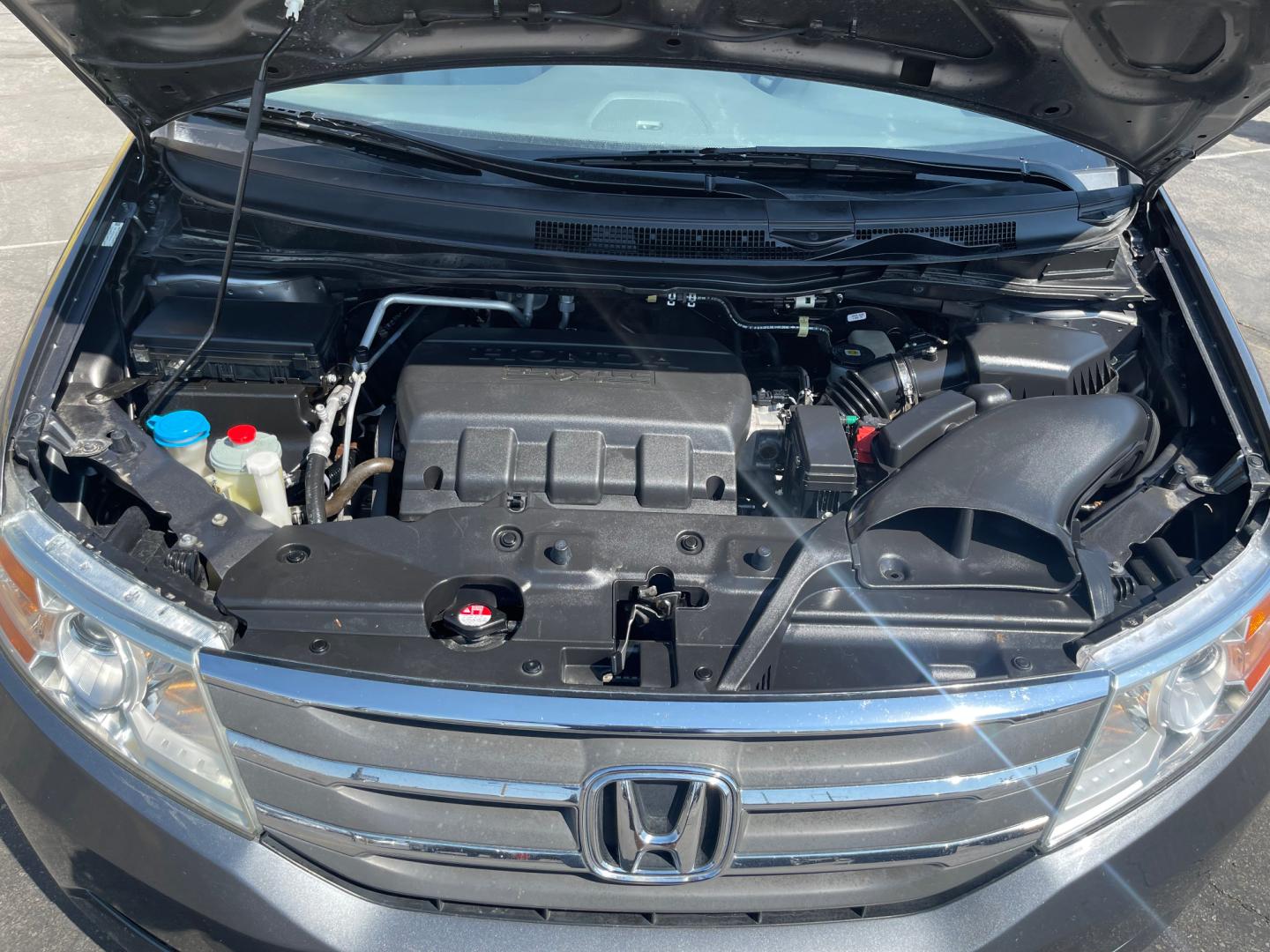 2013 Sterling Gray Metallic /Tan Honda Odyssey EX-L (5FNRL5H63DB) with an 3.5L V6 engine, Automatic transmission, located at 801 South State Street, Salt Lake City, UT, 84111, (801) 328-0098, 40.751953, -111.888206 - Clean title! 8 passenger van very clean condition! Easy clean leather interior! Features: Alloy Wheels, Rear Air Conditioning, Bluetooth Technology, Rear Sunshade, Fold-Away Third Row, Rear View Camera, Front Seat Heaters, Satellite Radio Ready, Leather Seats, Sunroof(s), Navigation System, Third - Photo#23