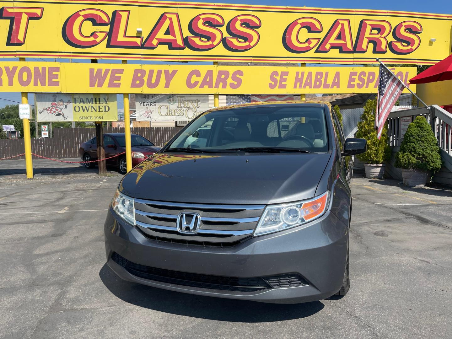 2013 Sterling Gray Metallic /Tan Honda Odyssey EX-L (5FNRL5H63DB) with an 3.5L V6 engine, Automatic transmission, located at 801 South State Street, Salt Lake City, UT, 84111, (801) 328-0098, 40.751953, -111.888206 - Clean title! 8 passenger van very clean condition! Easy clean leather interior! Features: Alloy Wheels, Rear Air Conditioning, Bluetooth Technology, Rear Sunshade, Fold-Away Third Row, Rear View Camera, Front Seat Heaters, Satellite Radio Ready, Leather Seats, Sunroof(s), Navigation System, Third - Photo#1