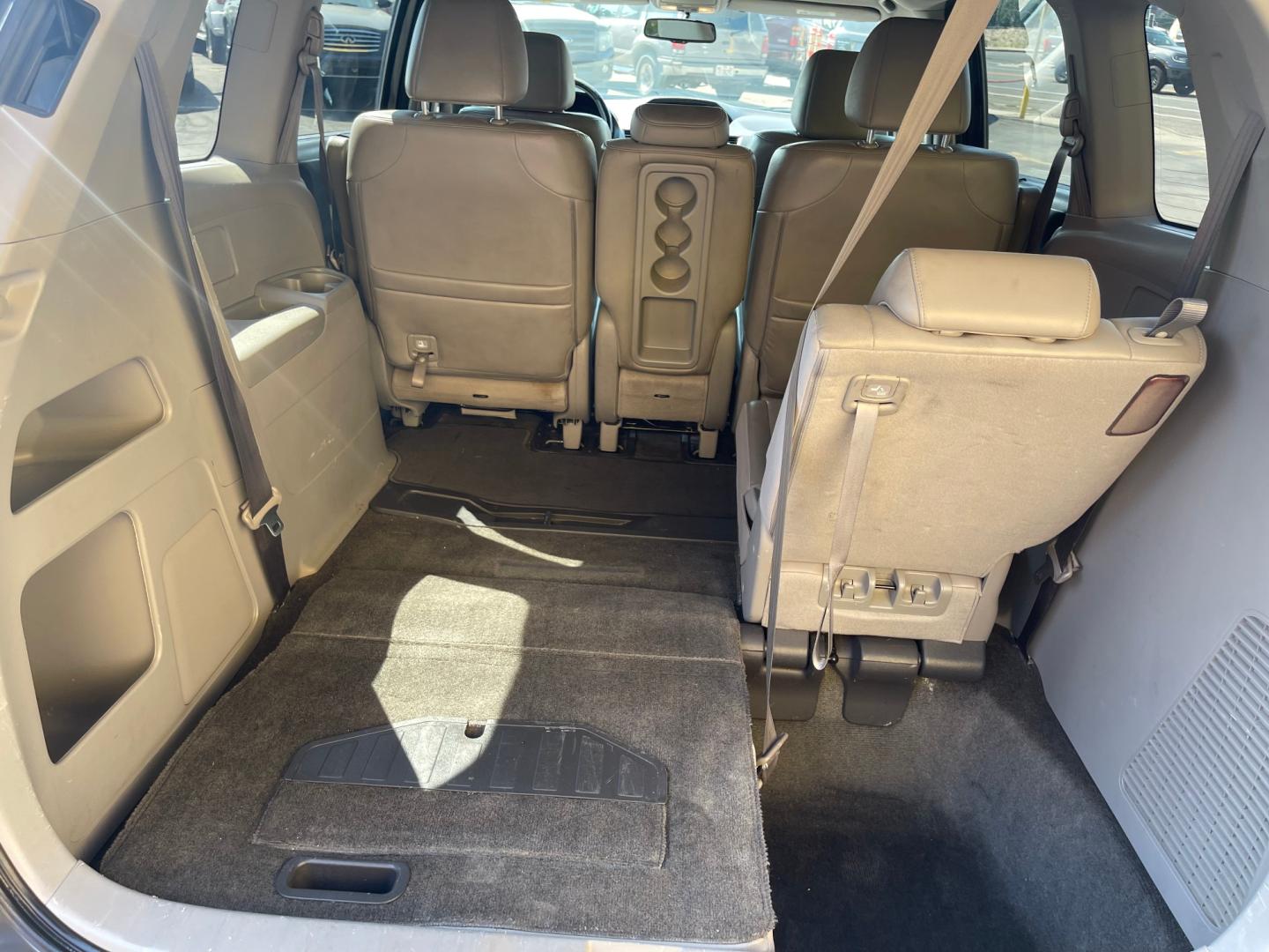 2013 Sterling Gray Metallic /Tan Honda Odyssey EX-L (5FNRL5H63DB) with an 3.5L V6 engine, Automatic transmission, located at 801 South State Street, Salt Lake City, UT, 84111, (801) 328-0098, 40.751953, -111.888206 - Clean title! 8 passenger van very clean condition! Easy clean leather interior! Features: Alloy Wheels, Rear Air Conditioning, Bluetooth Technology, Rear Sunshade, Fold-Away Third Row, Rear View Camera, Front Seat Heaters, Satellite Radio Ready, Leather Seats, Sunroof(s), Navigation System, Third - Photo#27