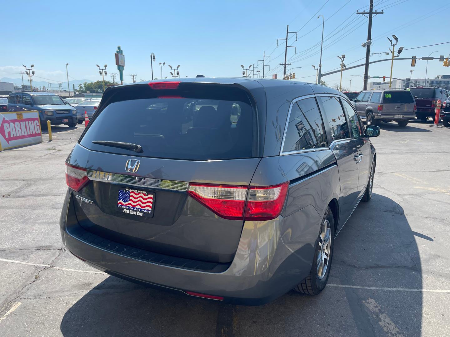 2013 Sterling Gray Metallic /Tan Honda Odyssey EX-L (5FNRL5H63DB) with an 3.5L V6 engine, Automatic transmission, located at 801 South State Street, Salt Lake City, UT, 84111, (801) 328-0098, 40.751953, -111.888206 - Clean title! 8 passenger van very clean condition! Easy clean leather interior! Features: Alloy Wheels, Rear Air Conditioning, Bluetooth Technology, Rear Sunshade, Fold-Away Third Row, Rear View Camera, Front Seat Heaters, Satellite Radio Ready, Leather Seats, Sunroof(s), Navigation System, Third - Photo#6