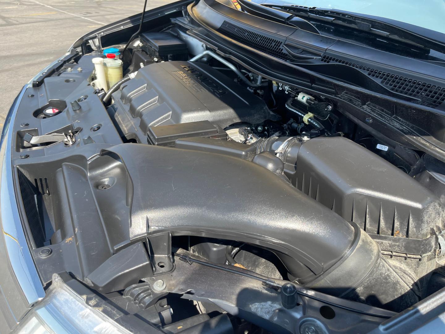 2013 Sterling Gray Metallic /Tan Honda Odyssey EX-L (5FNRL5H63DB) with an 3.5L V6 engine, Automatic transmission, located at 801 South State Street, Salt Lake City, UT, 84111, (801) 328-0098, 40.751953, -111.888206 - Clean title! 8 passenger van very clean condition! Easy clean leather interior! Features: Alloy Wheels, Rear Air Conditioning, Bluetooth Technology, Rear Sunshade, Fold-Away Third Row, Rear View Camera, Front Seat Heaters, Satellite Radio Ready, Leather Seats, Sunroof(s), Navigation System, Third - Photo#24