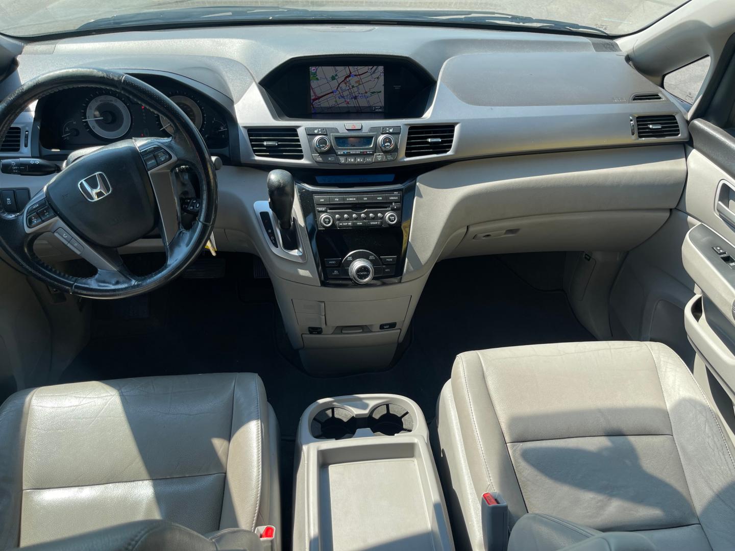 2013 Sterling Gray Metallic /Tan Honda Odyssey EX-L (5FNRL5H63DB) with an 3.5L V6 engine, Automatic transmission, located at 801 South State Street, Salt Lake City, UT, 84111, (801) 328-0098, 40.751953, -111.888206 - Clean title! 8 passenger van very clean condition! Easy clean leather interior! Features: Alloy Wheels, Rear Air Conditioning, Bluetooth Technology, Rear Sunshade, Fold-Away Third Row, Rear View Camera, Front Seat Heaters, Satellite Radio Ready, Leather Seats, Sunroof(s), Navigation System, Third - Photo#13