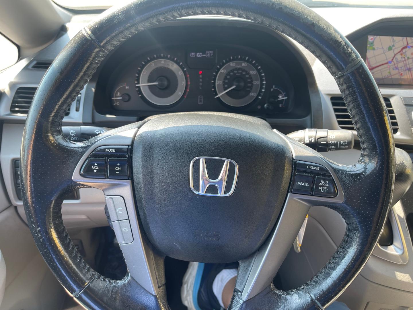 2013 Sterling Gray Metallic /Tan Honda Odyssey EX-L (5FNRL5H63DB) with an 3.5L V6 engine, Automatic transmission, located at 801 South State Street, Salt Lake City, UT, 84111, (801) 328-0098, 40.751953, -111.888206 - Clean title! 8 passenger van very clean condition! Easy clean leather interior! Features: Alloy Wheels, Rear Air Conditioning, Bluetooth Technology, Rear Sunshade, Fold-Away Third Row, Rear View Camera, Front Seat Heaters, Satellite Radio Ready, Leather Seats, Sunroof(s), Navigation System, Third - Photo#17