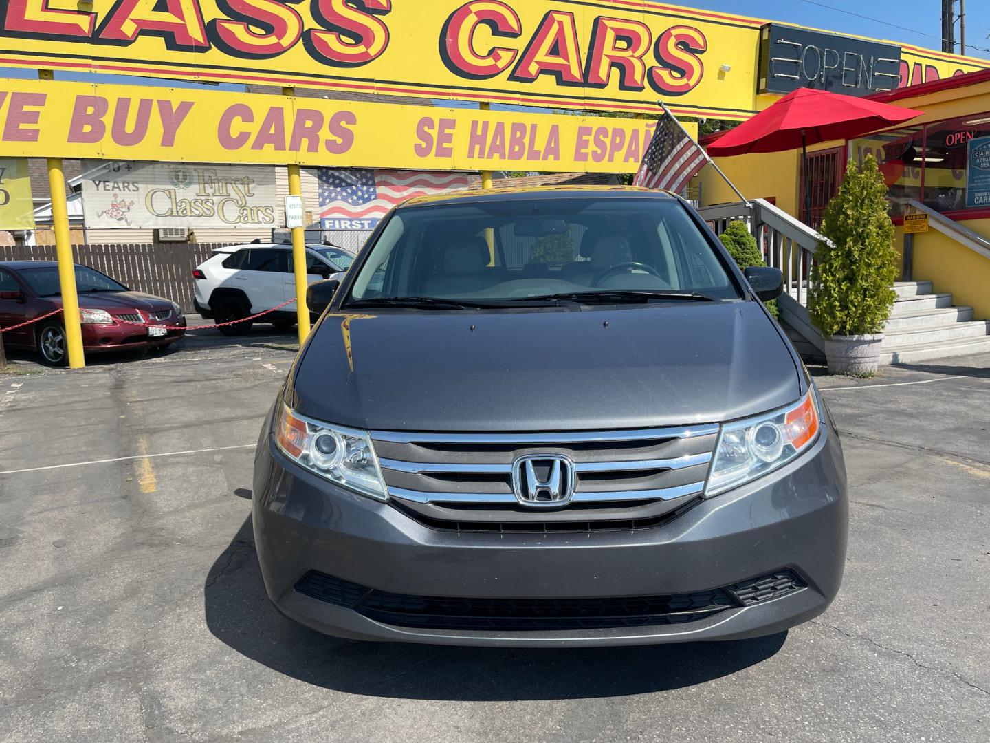 2013 Sterling Gray Metallic /Tan Honda Odyssey EX-L (5FNRL5H63DB) with an 3.5L V6 engine, Automatic transmission, located at 801 South State Street, Salt Lake City, UT, 84111, (801) 328-0098, 40.751953, -111.888206 - Clean title! 8 passenger van very clean condition! Easy clean leather interior! Features: Alloy Wheels, Rear Air Conditioning, Bluetooth Technology, Rear Sunshade, Fold-Away Third Row, Rear View Camera, Front Seat Heaters, Satellite Radio Ready, Leather Seats, Sunroof(s), Navigation System, Third - Photo#2