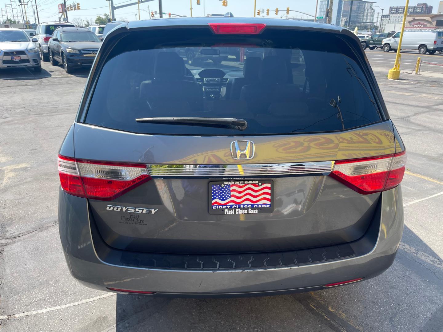 2013 Sterling Gray Metallic /Tan Honda Odyssey EX-L (5FNRL5H63DB) with an 3.5L V6 engine, Automatic transmission, located at 801 South State Street, Salt Lake City, UT, 84111, (801) 328-0098, 40.751953, -111.888206 - Clean title! 8 passenger van very clean condition! Easy clean leather interior! Features: Alloy Wheels, Rear Air Conditioning, Bluetooth Technology, Rear Sunshade, Fold-Away Third Row, Rear View Camera, Front Seat Heaters, Satellite Radio Ready, Leather Seats, Sunroof(s), Navigation System, Third - Photo#7