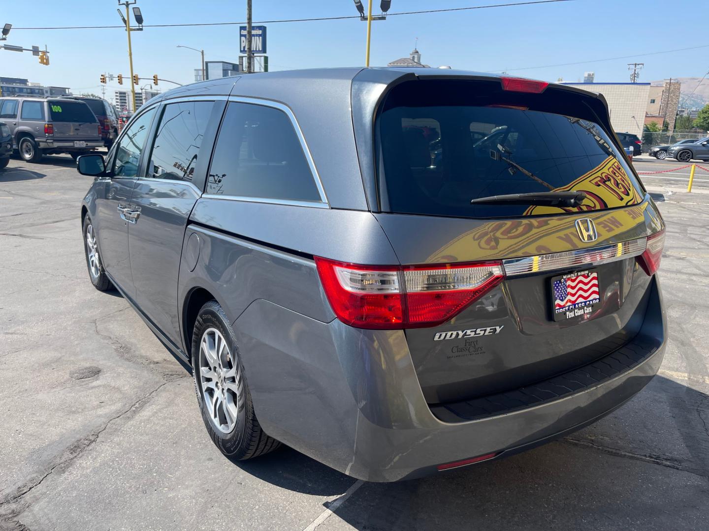 2013 Sterling Gray Metallic /Tan Honda Odyssey EX-L (5FNRL5H63DB) with an 3.5L V6 engine, Automatic transmission, located at 801 South State Street, Salt Lake City, UT, 84111, (801) 328-0098, 40.751953, -111.888206 - Clean title! 8 passenger van very clean condition! Easy clean leather interior! Features: Alloy Wheels, Rear Air Conditioning, Bluetooth Technology, Rear Sunshade, Fold-Away Third Row, Rear View Camera, Front Seat Heaters, Satellite Radio Ready, Leather Seats, Sunroof(s), Navigation System, Third - Photo#8