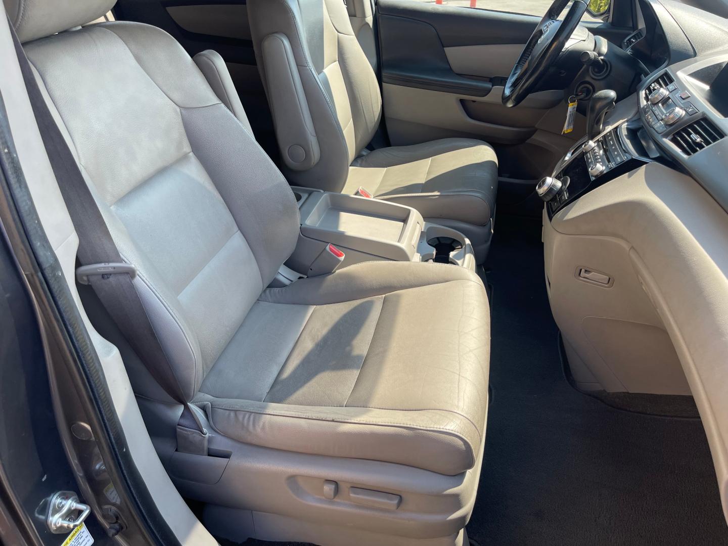 2013 Sterling Gray Metallic /Tan Honda Odyssey EX-L (5FNRL5H63DB) with an 3.5L V6 engine, Automatic transmission, located at 801 South State Street, Salt Lake City, UT, 84111, (801) 328-0098, 40.751953, -111.888206 - Clean title! 8 passenger van very clean condition! Easy clean leather interior! Features: Alloy Wheels, Rear Air Conditioning, Bluetooth Technology, Rear Sunshade, Fold-Away Third Row, Rear View Camera, Front Seat Heaters, Satellite Radio Ready, Leather Seats, Sunroof(s), Navigation System, Third - Photo#19