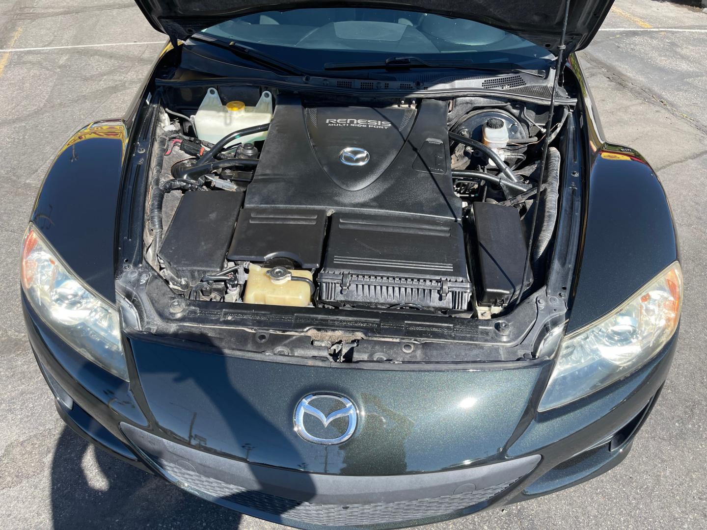 2010 Black Metallic /Black Mazda RX-8 RX8 Grand Touring (JM1FE1C43A0) with an 1.3L 4 Cylinder engine, Manual transmission, located at 801 South State Street, Salt Lake City, UT, 84111, (801) 328-0098, 40.751953, -111.888206 - Carfax 1 owner vehicle! Clean title no accidents on Carfax history report! Real clean in excellent condition for the year! Features: Alloy Wheels, Cloth Seats, ABS Brakes, CD Audio, Power Locks, Rear Spoiler, AM/FM Stereo, Cruise Control, Power Mirrors, Side Airbags, Air Conditioning, Manual Trans - Photo#21