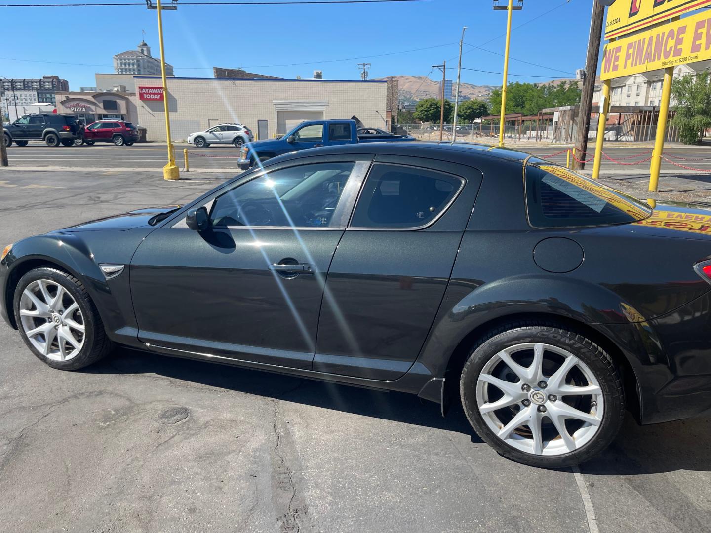 2010 Black Metallic /Black Mazda RX-8 RX8 Grand Touring (JM1FE1C43A0) with an 1.3L 4 Cylinder engine, Manual transmission, located at 801 South State Street, Salt Lake City, UT, 84111, (801) 328-0098, 40.751953, -111.888206 - Carfax 1 owner vehicle! Clean title no accidents on Carfax history report! Real clean in excellent condition for the year! Features: Alloy Wheels, Cloth Seats, ABS Brakes, CD Audio, Power Locks, Rear Spoiler, AM/FM Stereo, Cruise Control, Power Mirrors, Side Airbags, Air Conditioning, Manual Trans - Photo#9