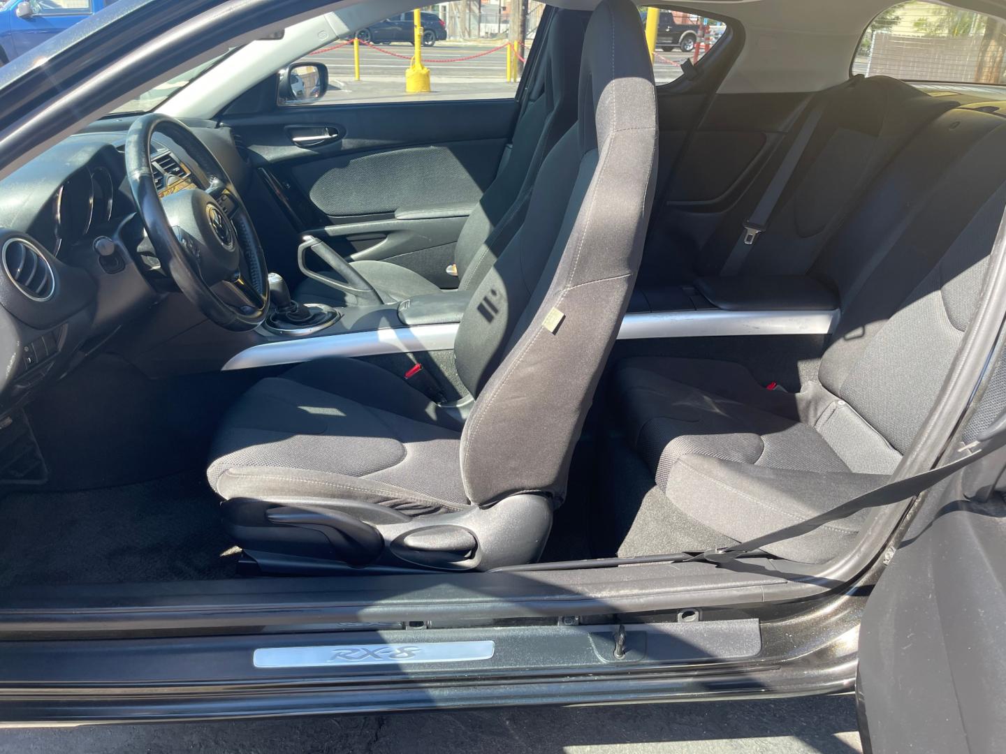 2010 Black Metallic /Black Mazda RX-8 RX8 Grand Touring (JM1FE1C43A0) with an 1.3L 4 Cylinder engine, Manual transmission, located at 801 South State Street, Salt Lake City, UT, 84111, (801) 328-0098, 40.751953, -111.888206 - Carfax 1 owner vehicle! Clean title no accidents on Carfax history report! Real clean in excellent condition for the year! Features: Alloy Wheels, Cloth Seats, ABS Brakes, CD Audio, Power Locks, Rear Spoiler, AM/FM Stereo, Cruise Control, Power Mirrors, Side Airbags, Air Conditioning, Manual Trans - Photo#13